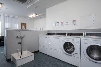 Central laundry facility with card operated machines